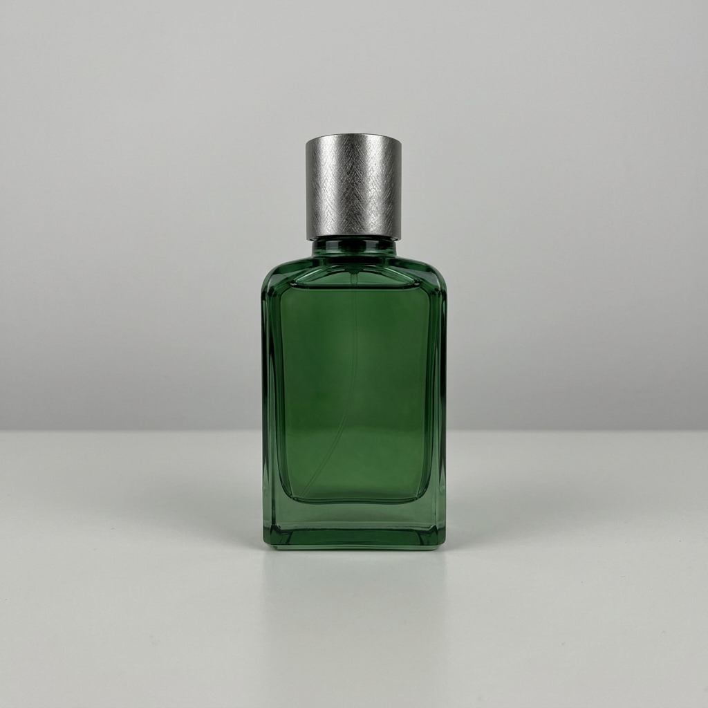 Unstyled fragrance bottle on a plain grey tabletop